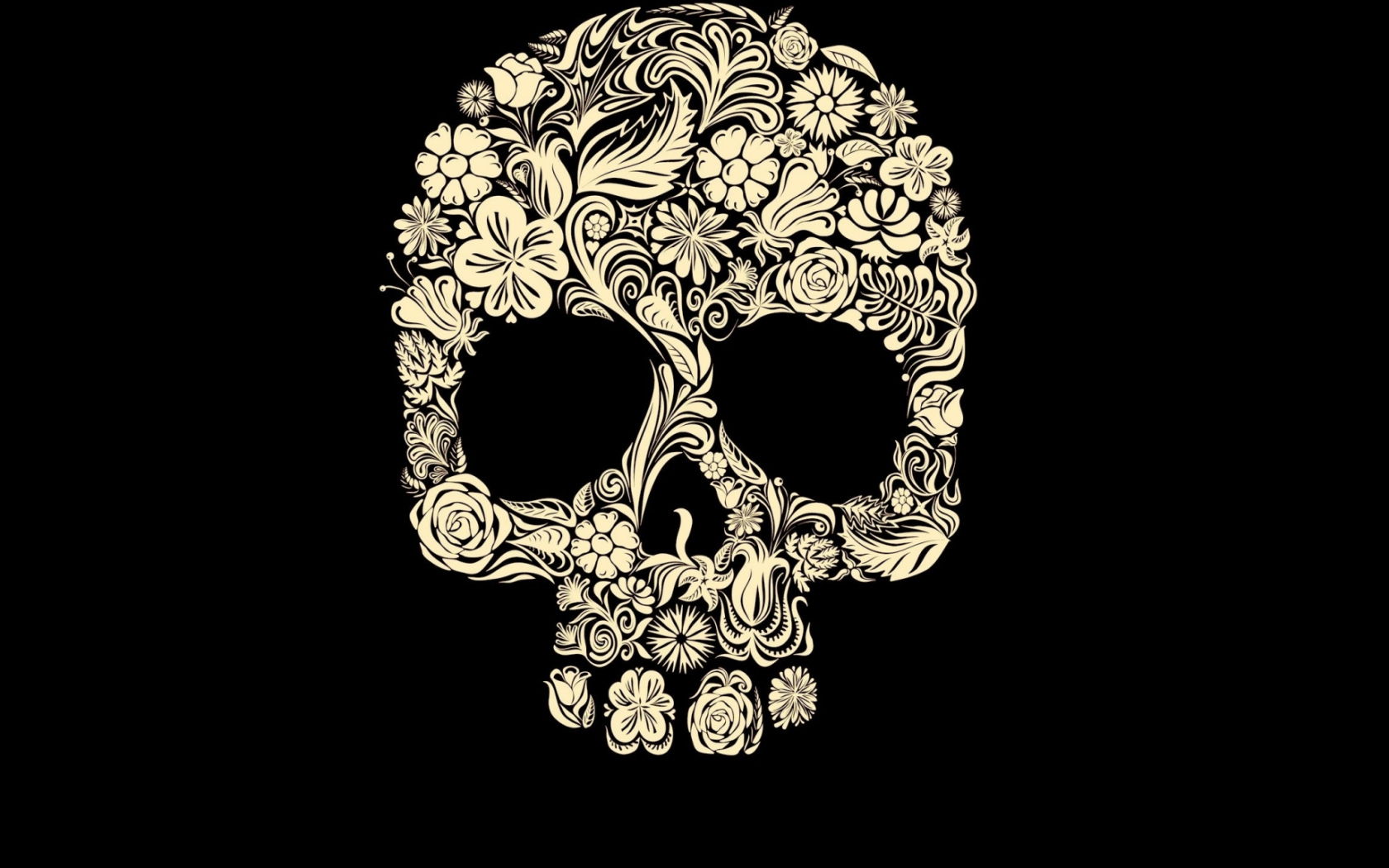 Череп из цветов на черном фоне