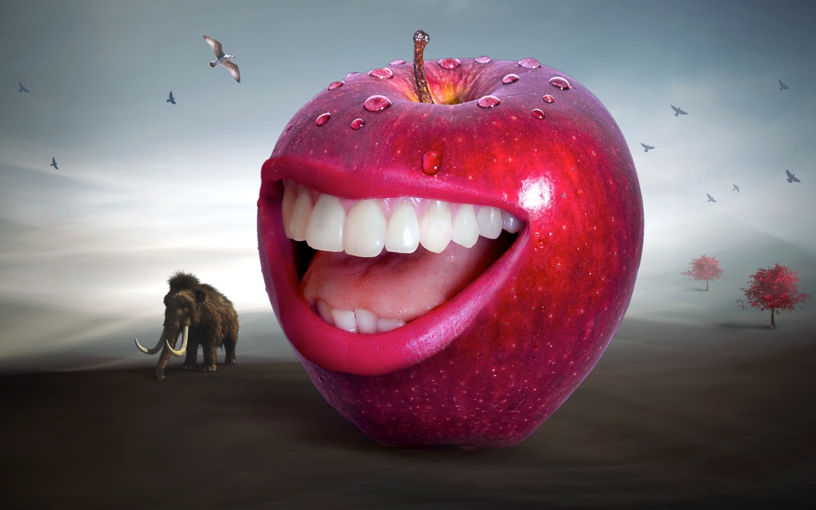 Красное яблоко с зубами