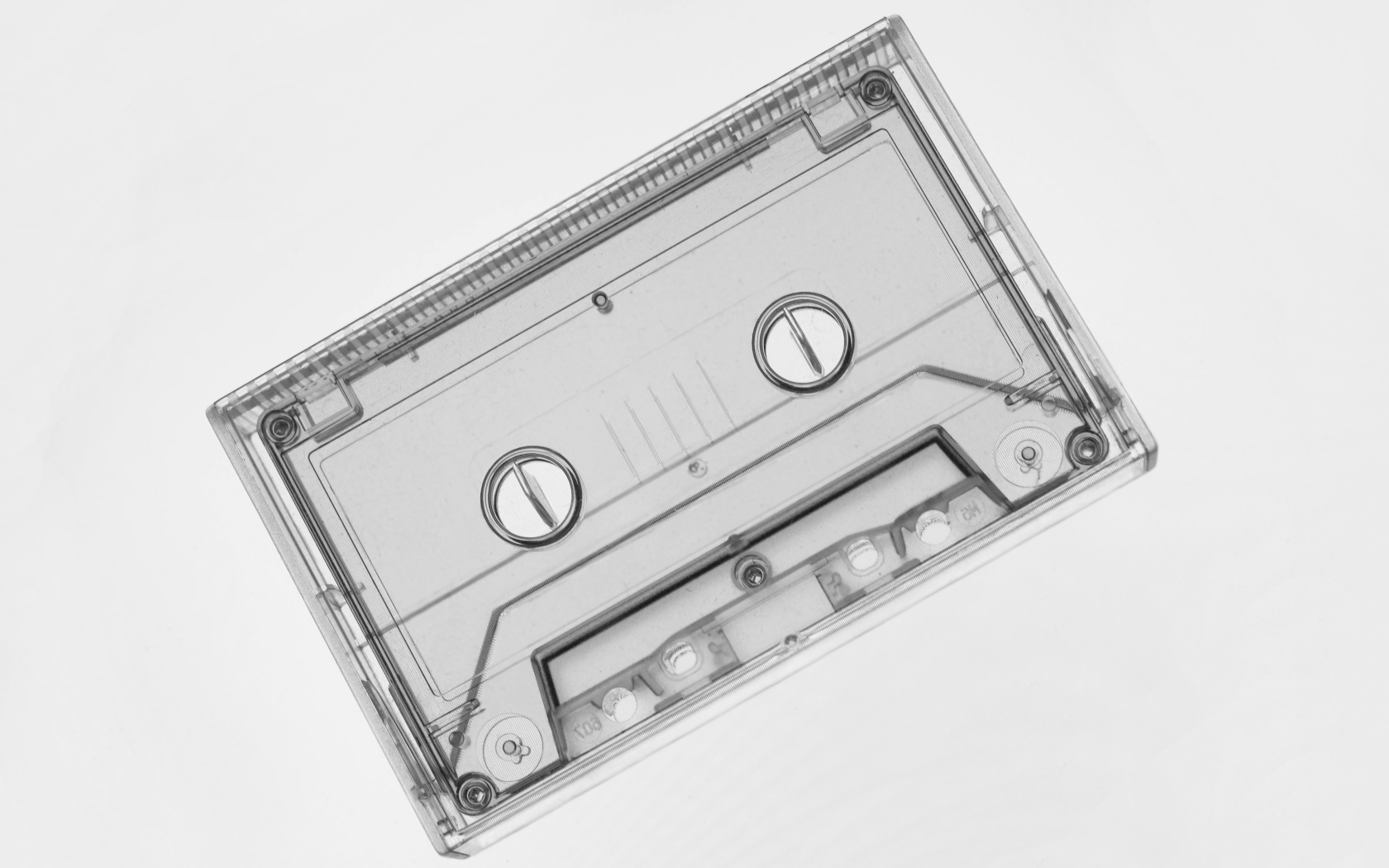 Прозрачная кассета на сером фоне