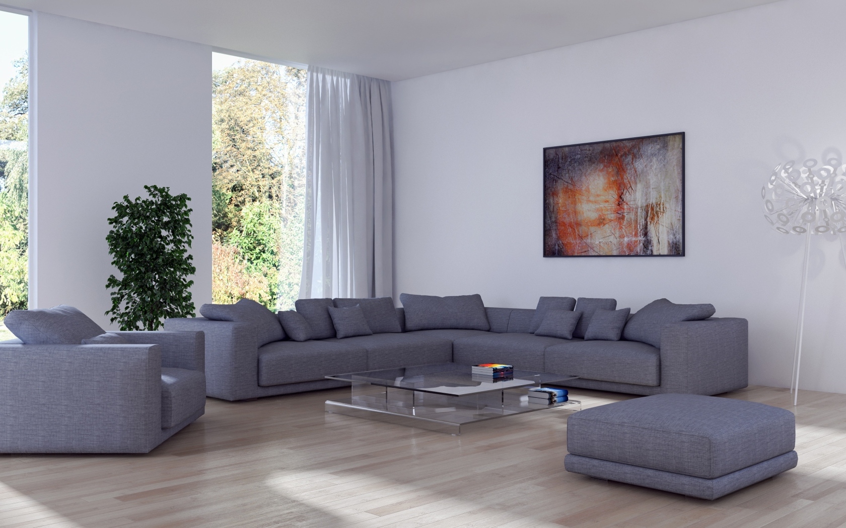 Большой серый диван в гостиной комнате