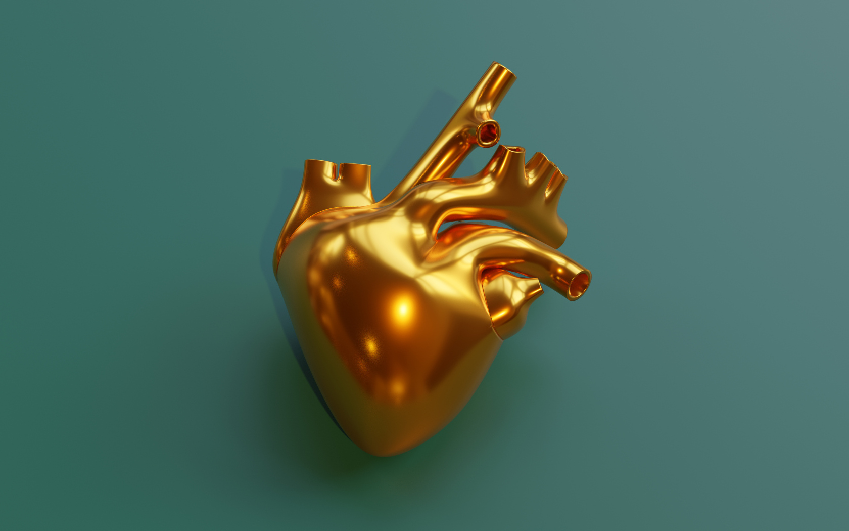 Золотое 3д сердце на зеленом фоне