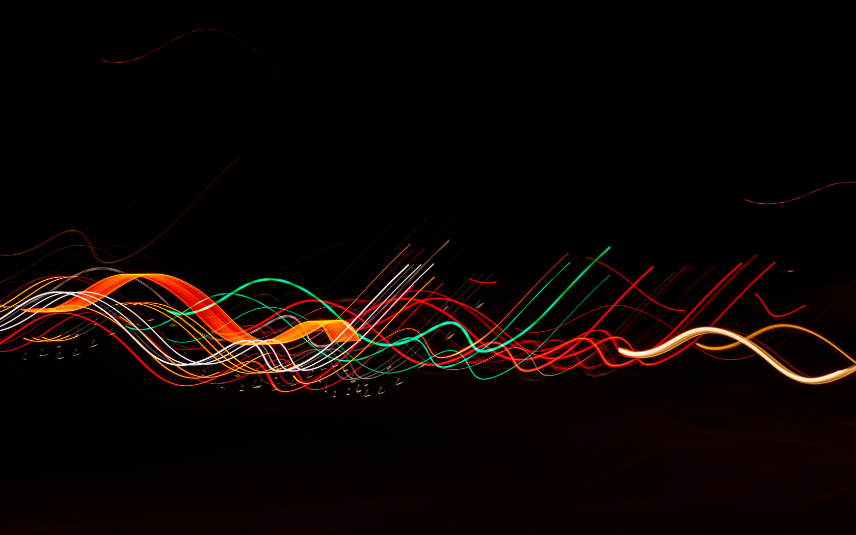 Разноцветные волнистые абстрактные линии на черном фоне