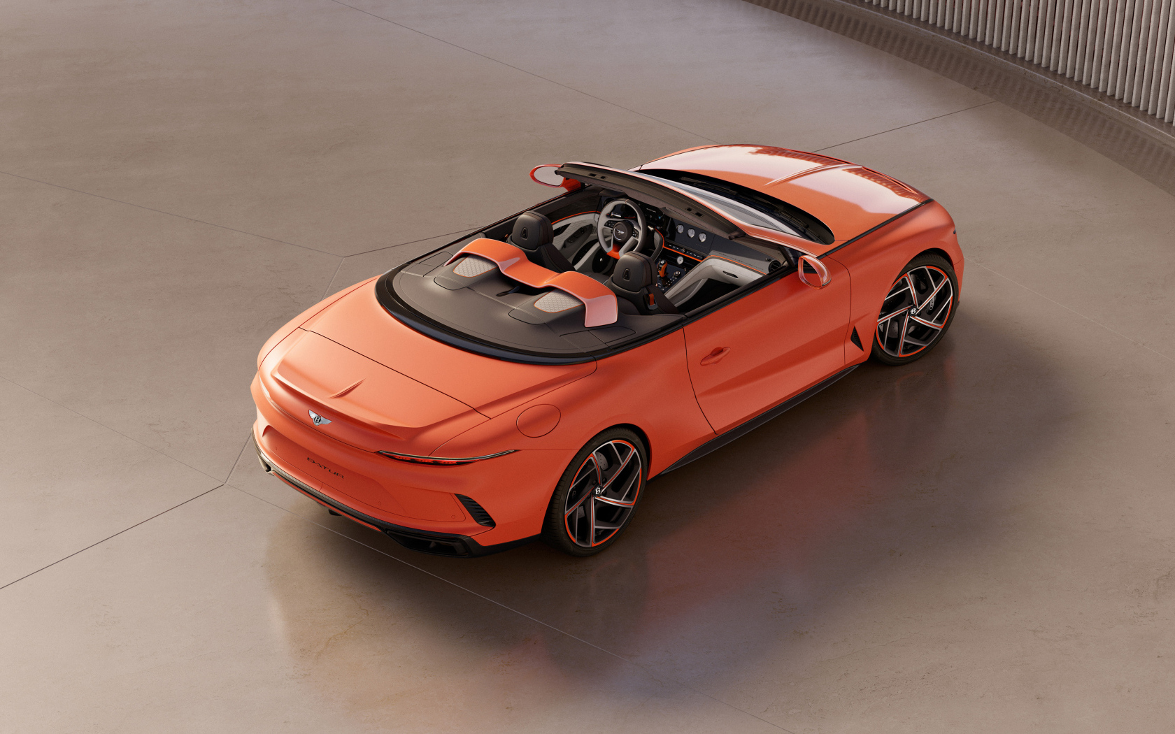 Красный автомобиль Bentley Mulliner Batur Convertible 2024 года вид сверху