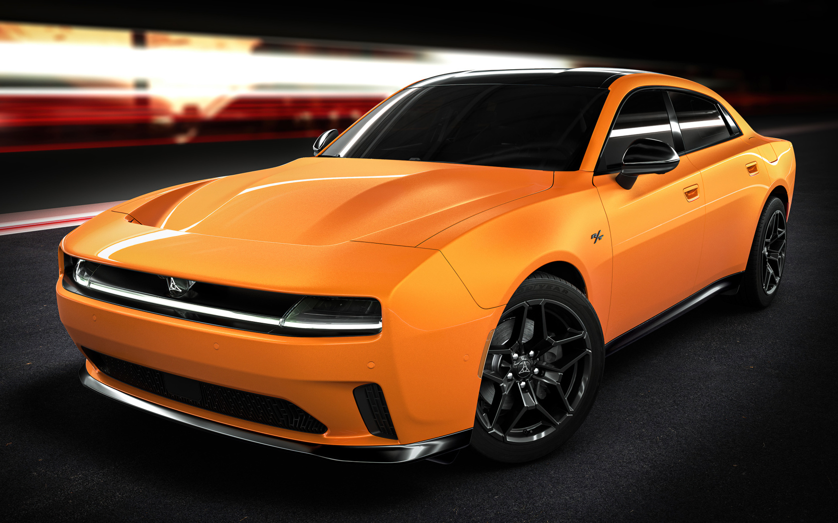 Вид спереди на оранжевый автомобиль Dodge Charger Daytona RT 2025 года
