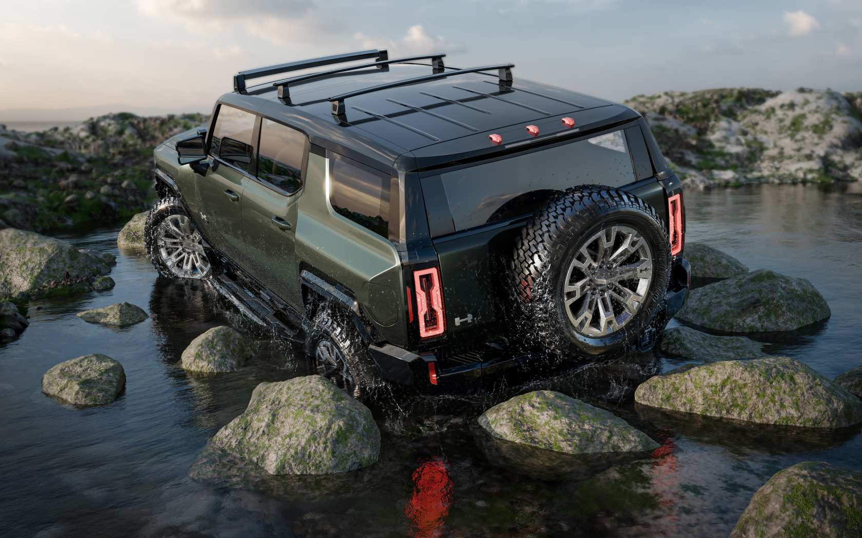 Внедорожник GMC Hummer EV Pickup 2024 года едет по камням