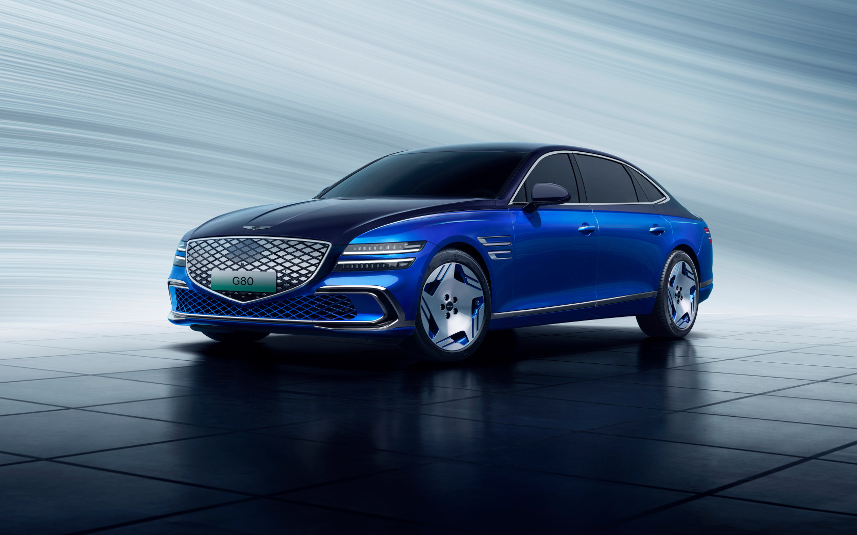 Синий автомобиль Genesis Electrified G80 2024 года