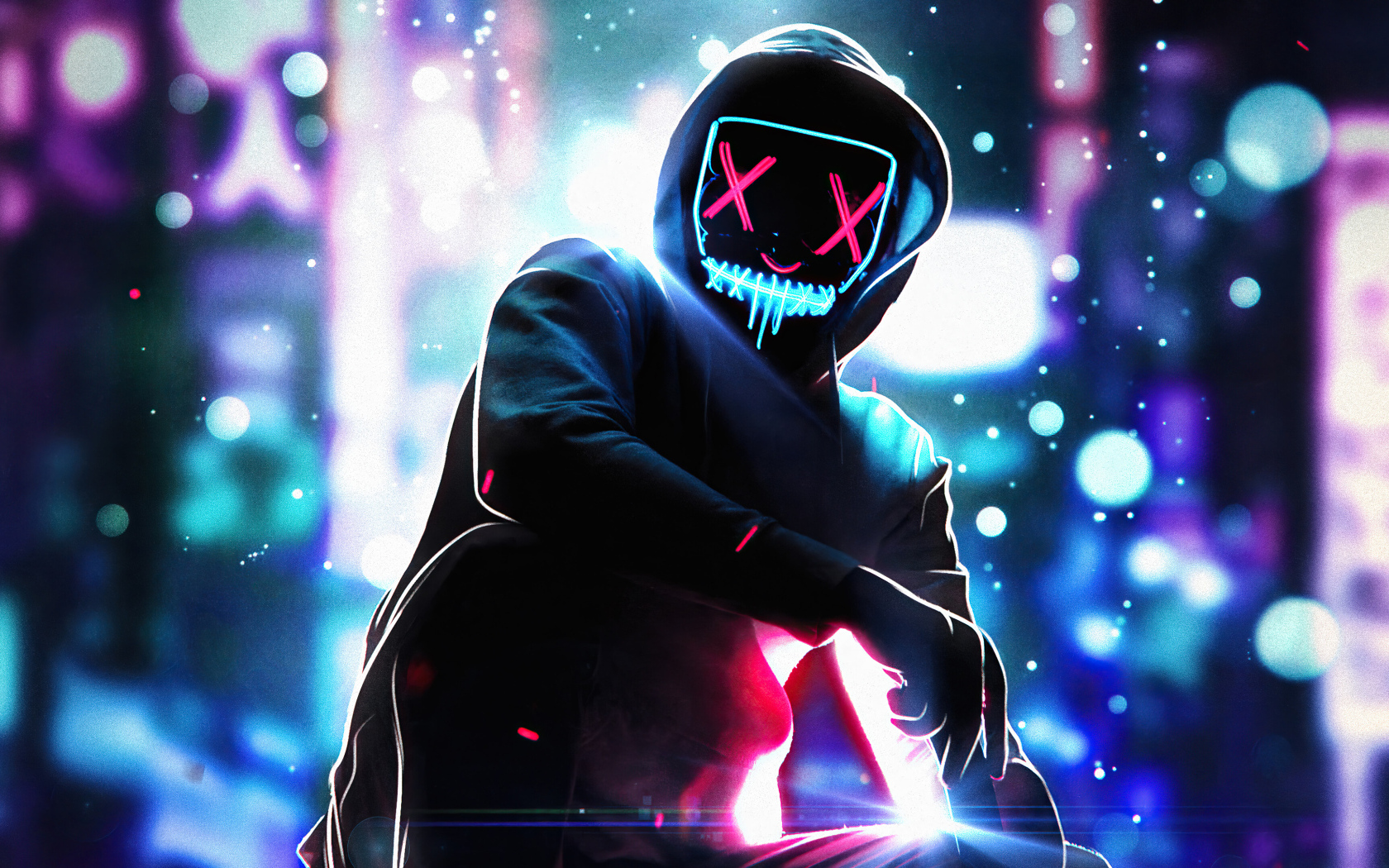 Мужчина в светящейся маске в худи