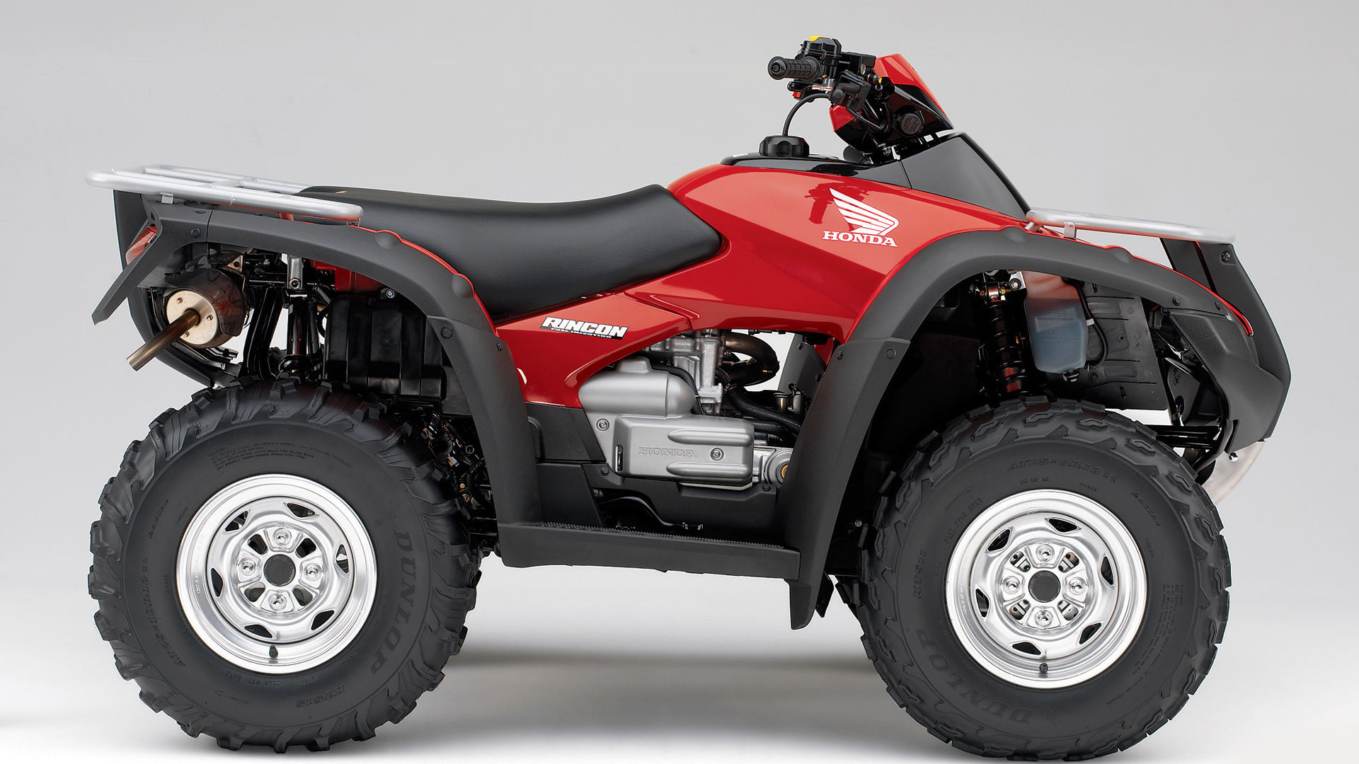 Красный Honda Rincon квадроцикл