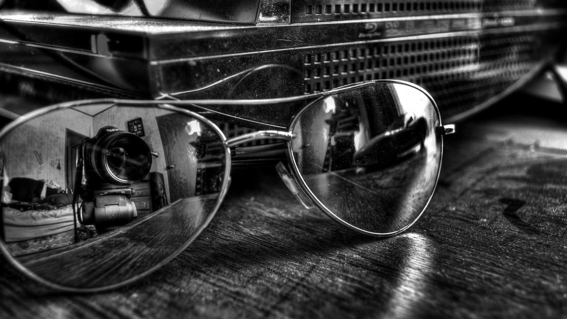 Объектив в отражении