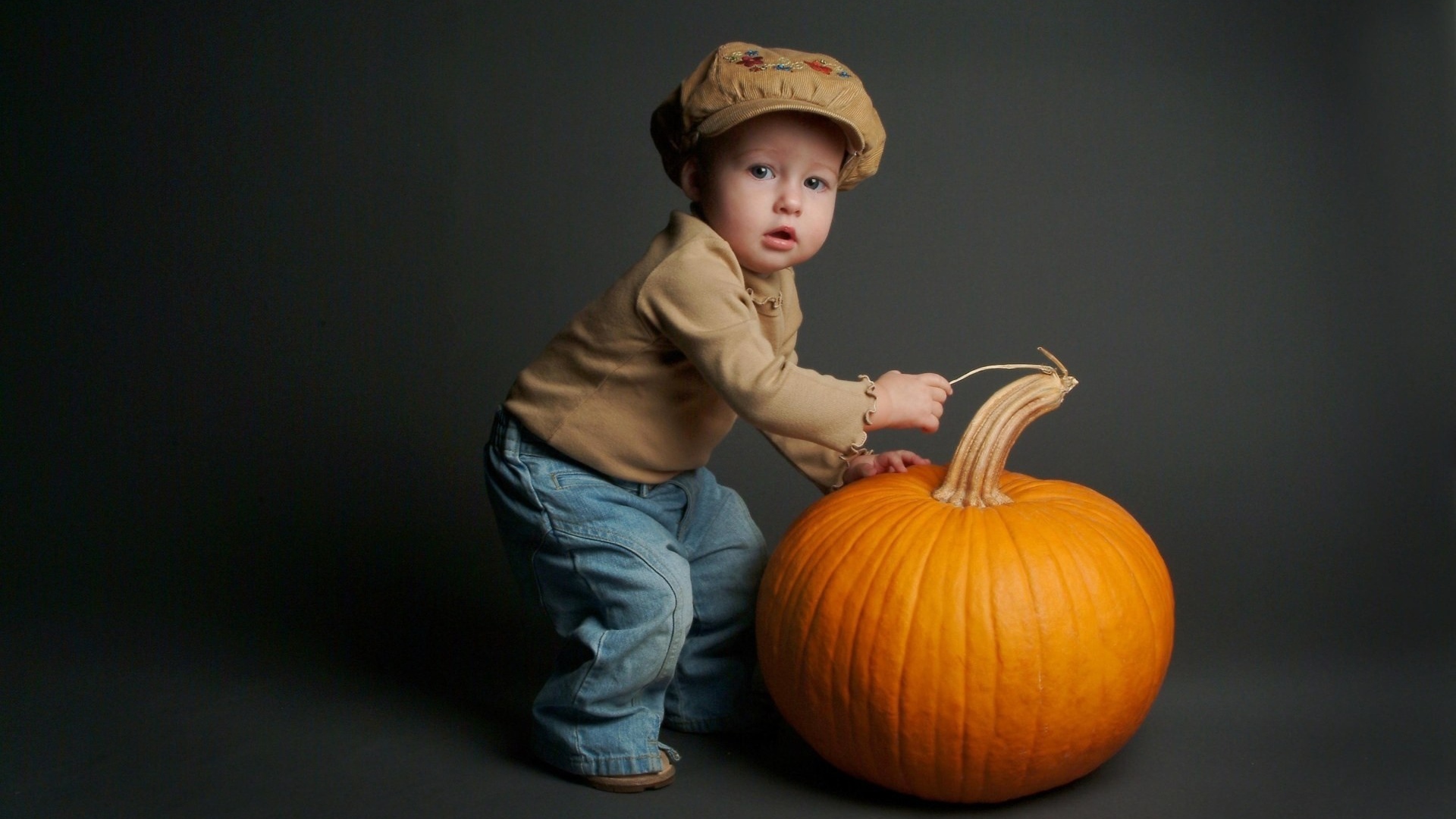 Baby and pumpkin