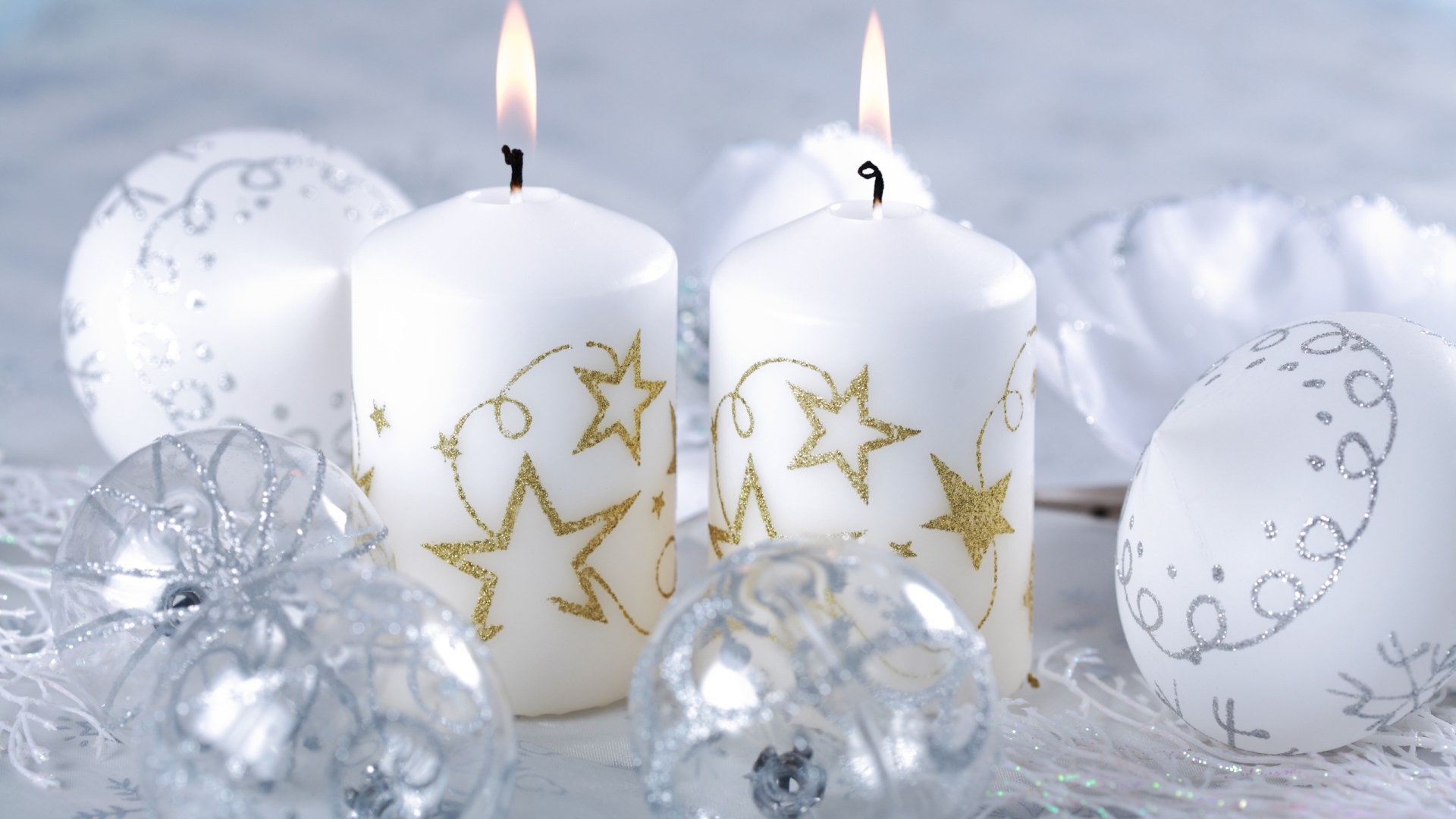 Burning white candles on Christmas