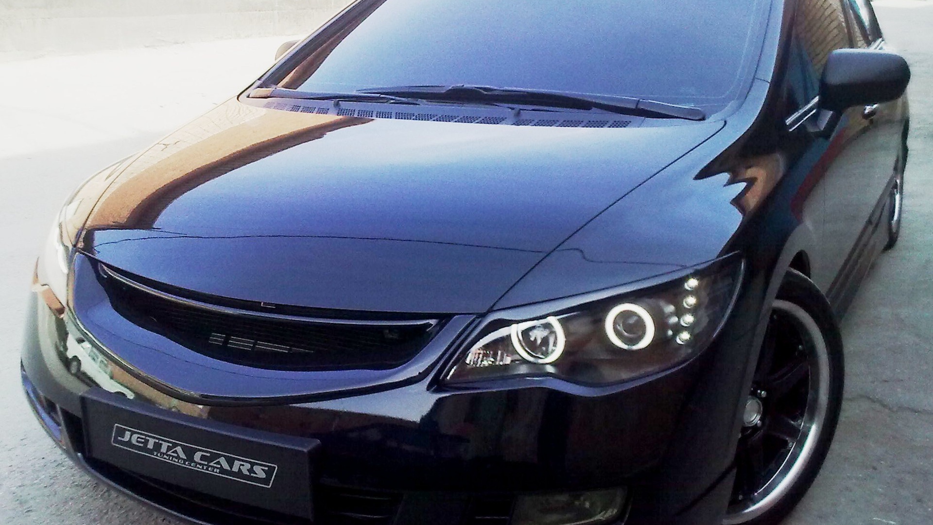 Фото автомобиля Honda Civic 4D