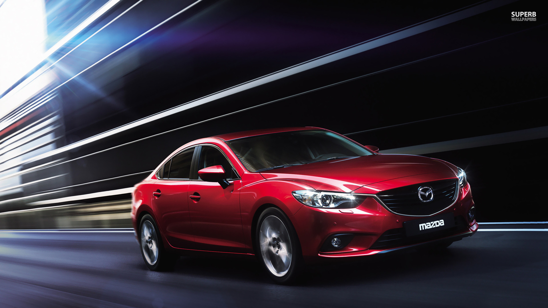 Надежная машина Mazda 3 2014