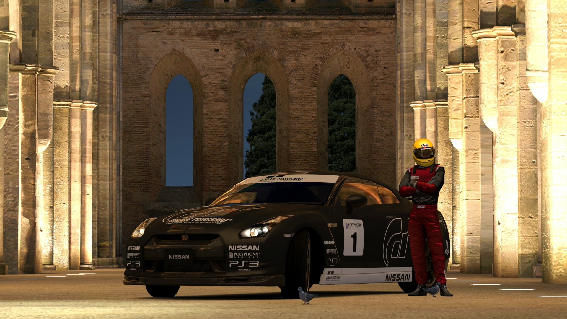 Гонщик у своей машины