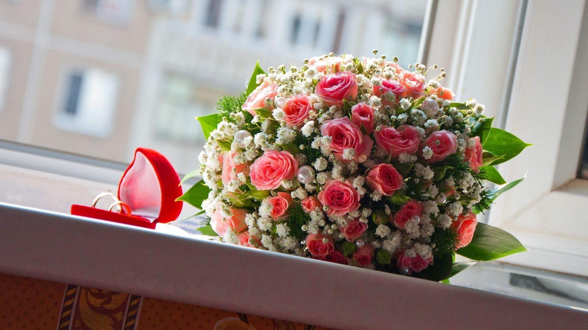 Свадебный букет и кольца