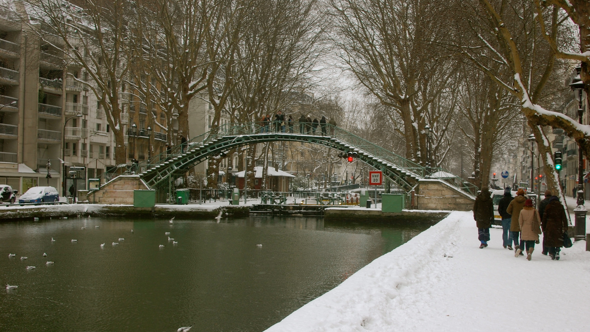 Snow in Paris bridge over the Seine