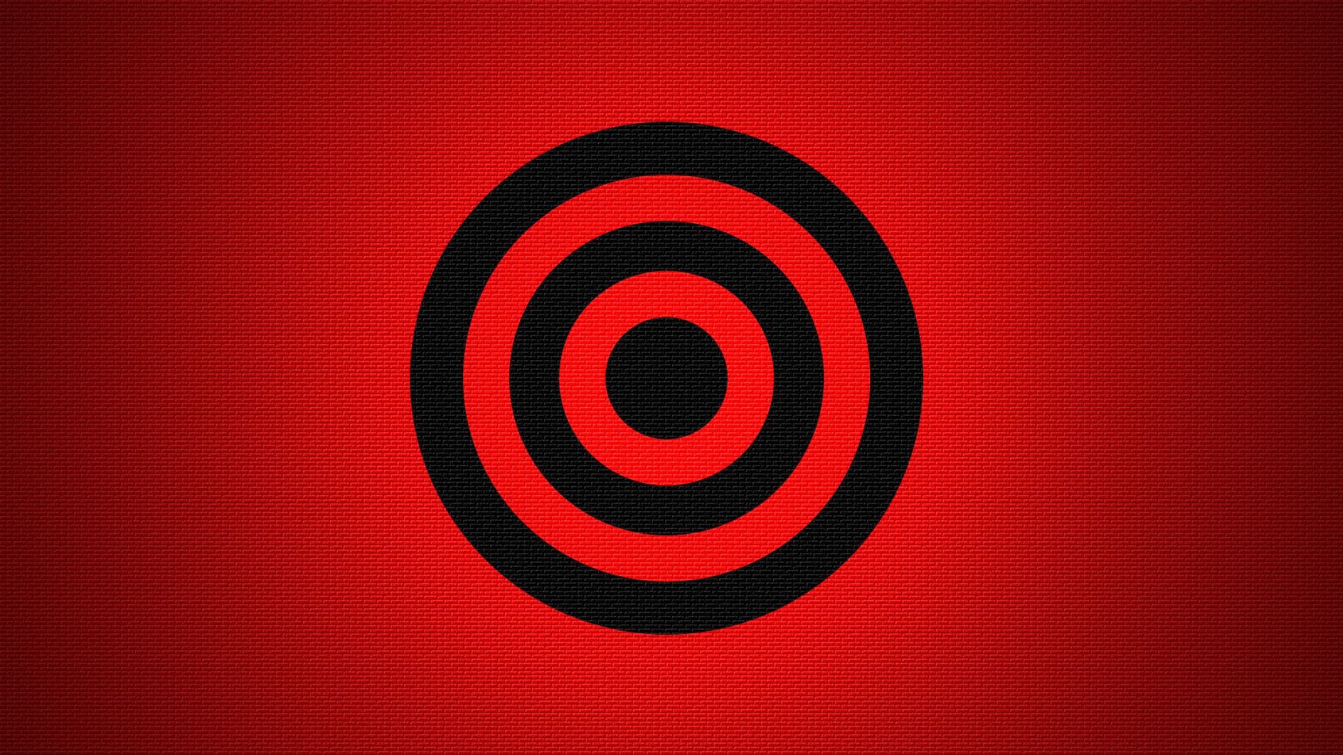 Черная мишень на красном фоне