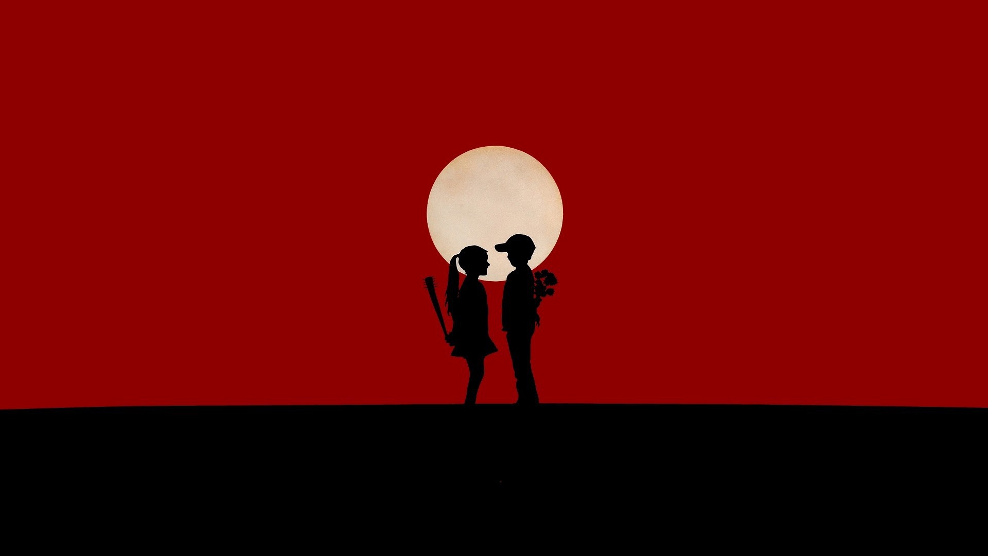 Мальчик и девочка на красном фоне