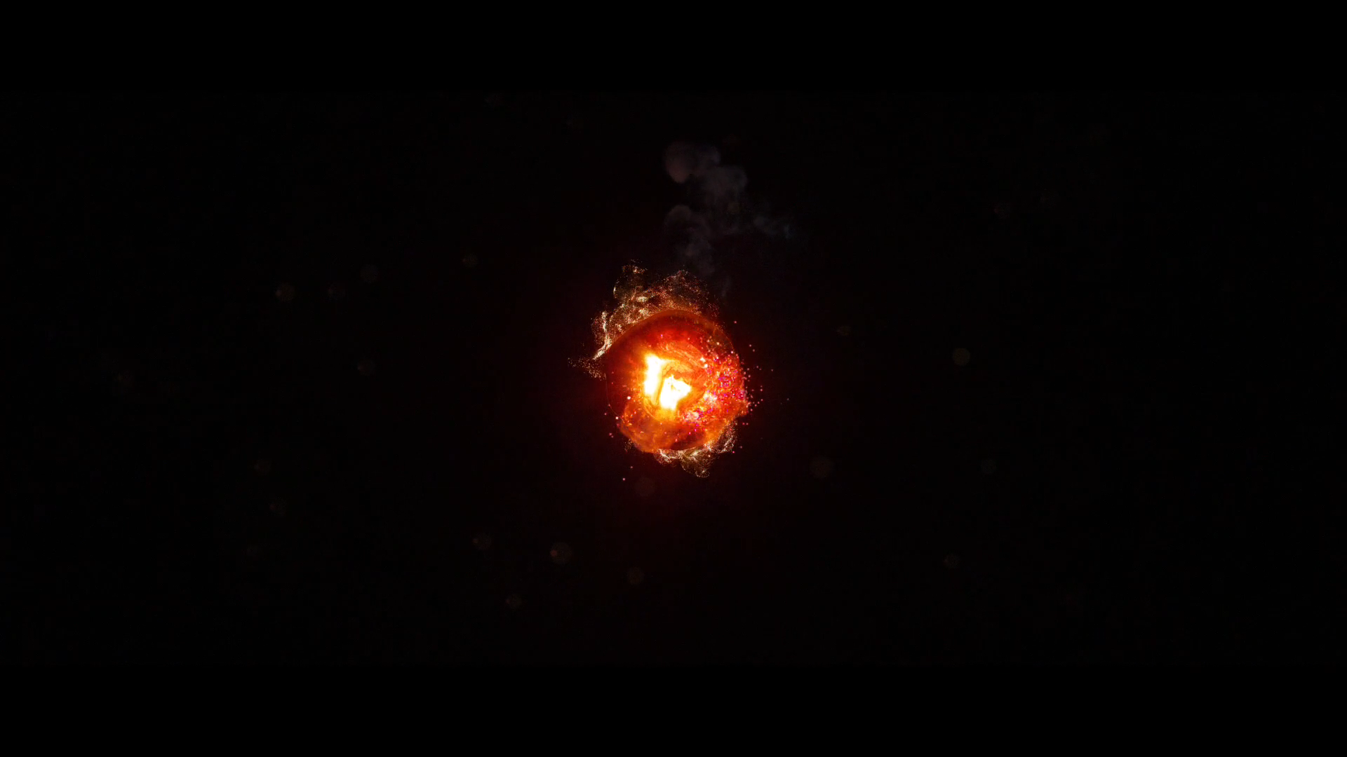 Горящий уголек, черный фон