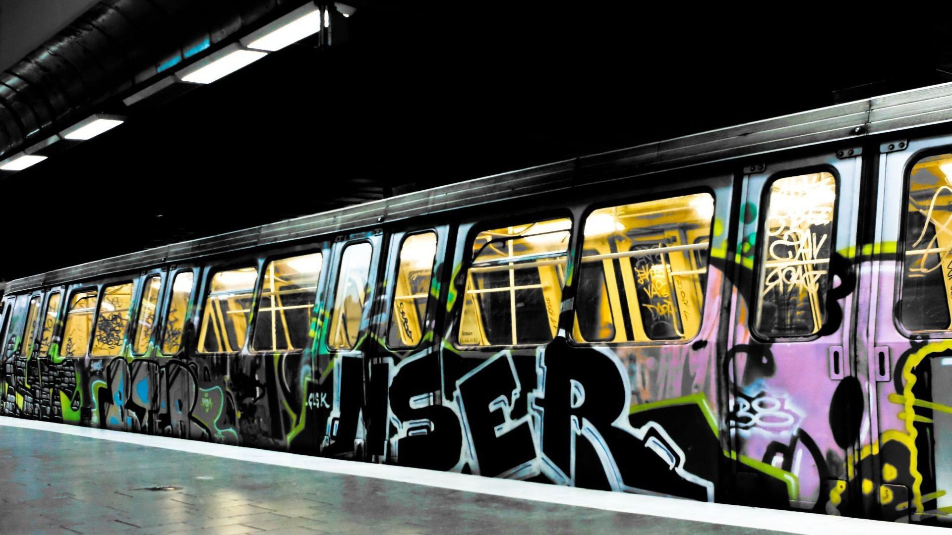 Subway train painted graffiti