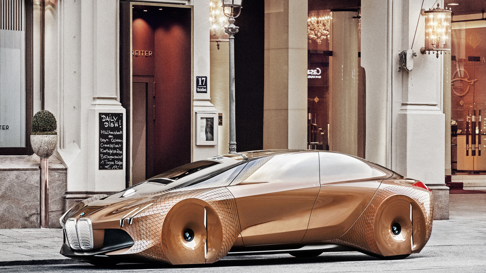Коричневый стильный автомобиль BMW Concept Vision Next 100