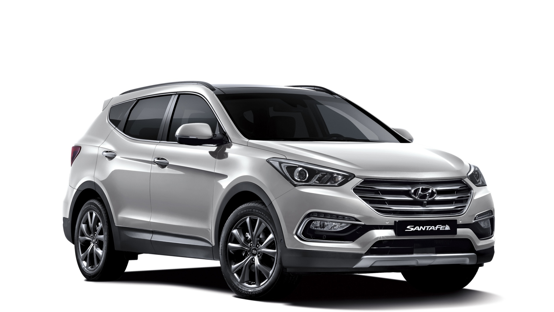 Серебристый автомобиль Hyundai Santa Fe  на белом фоне