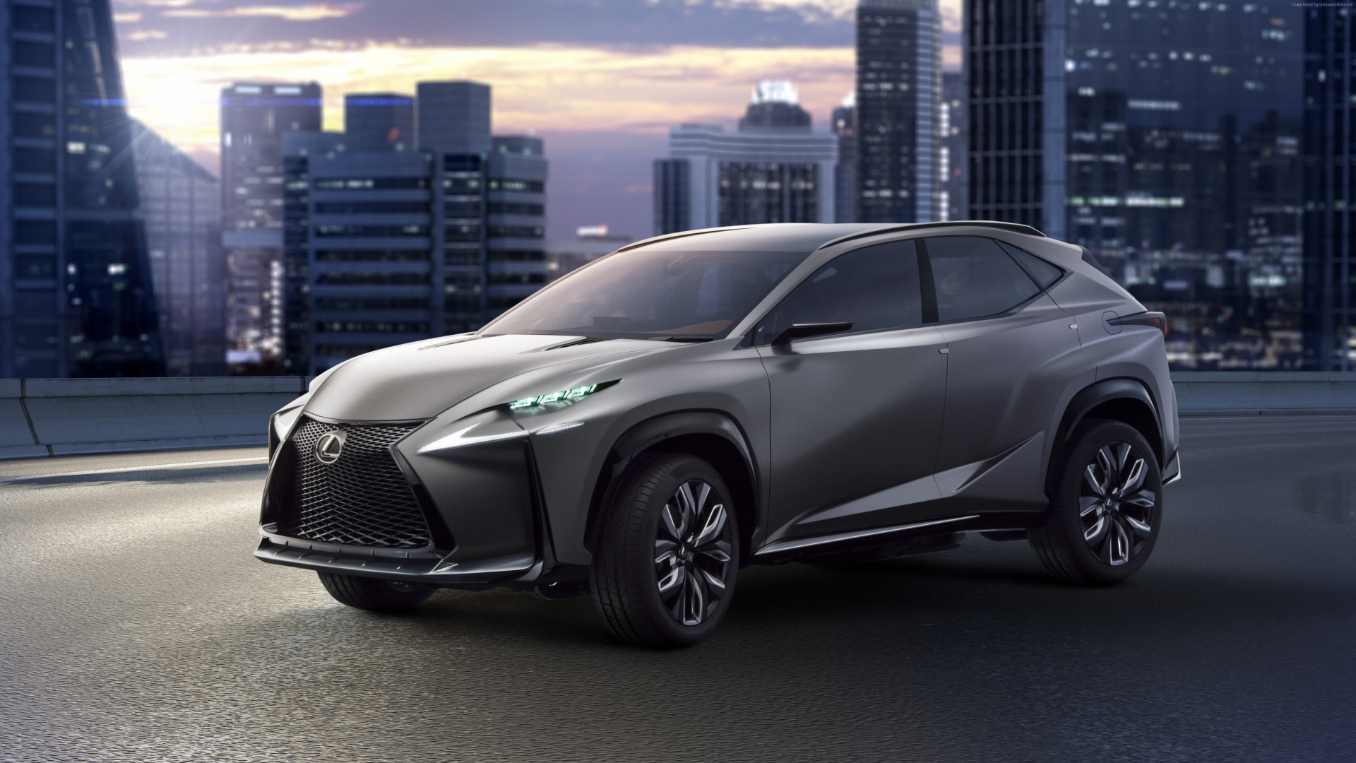 Серебристый кроссовер  Lexus LF-NX на фоне города
