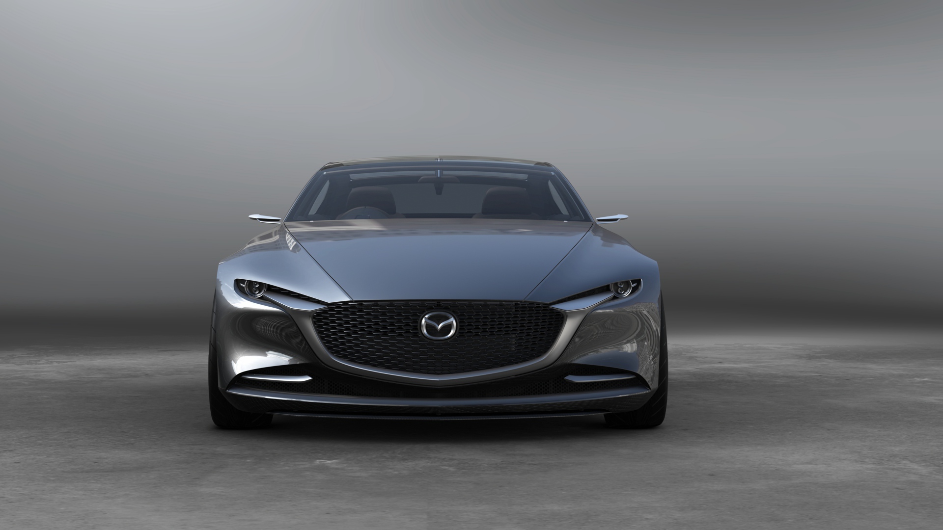 Серебристый автомобиль  Mazda Vision Coupe, 2017 вид спереди