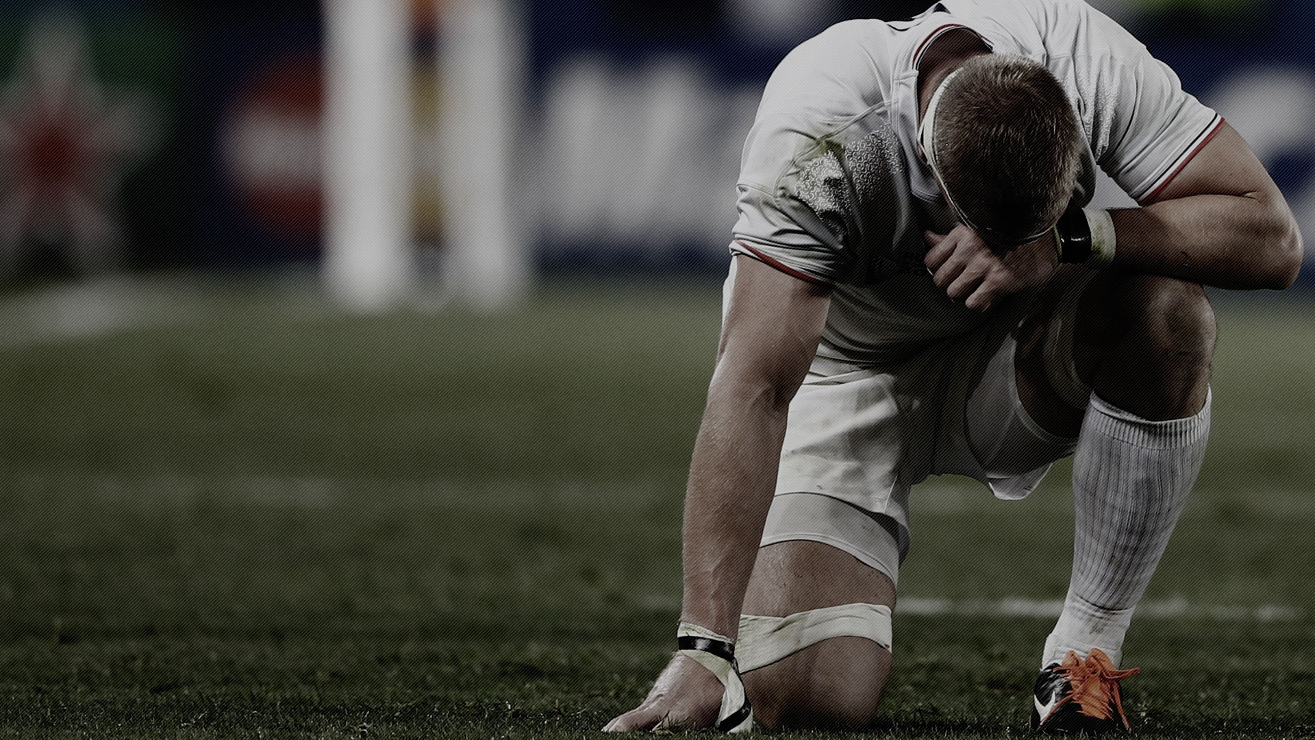 Спортсмен регбист на поле 