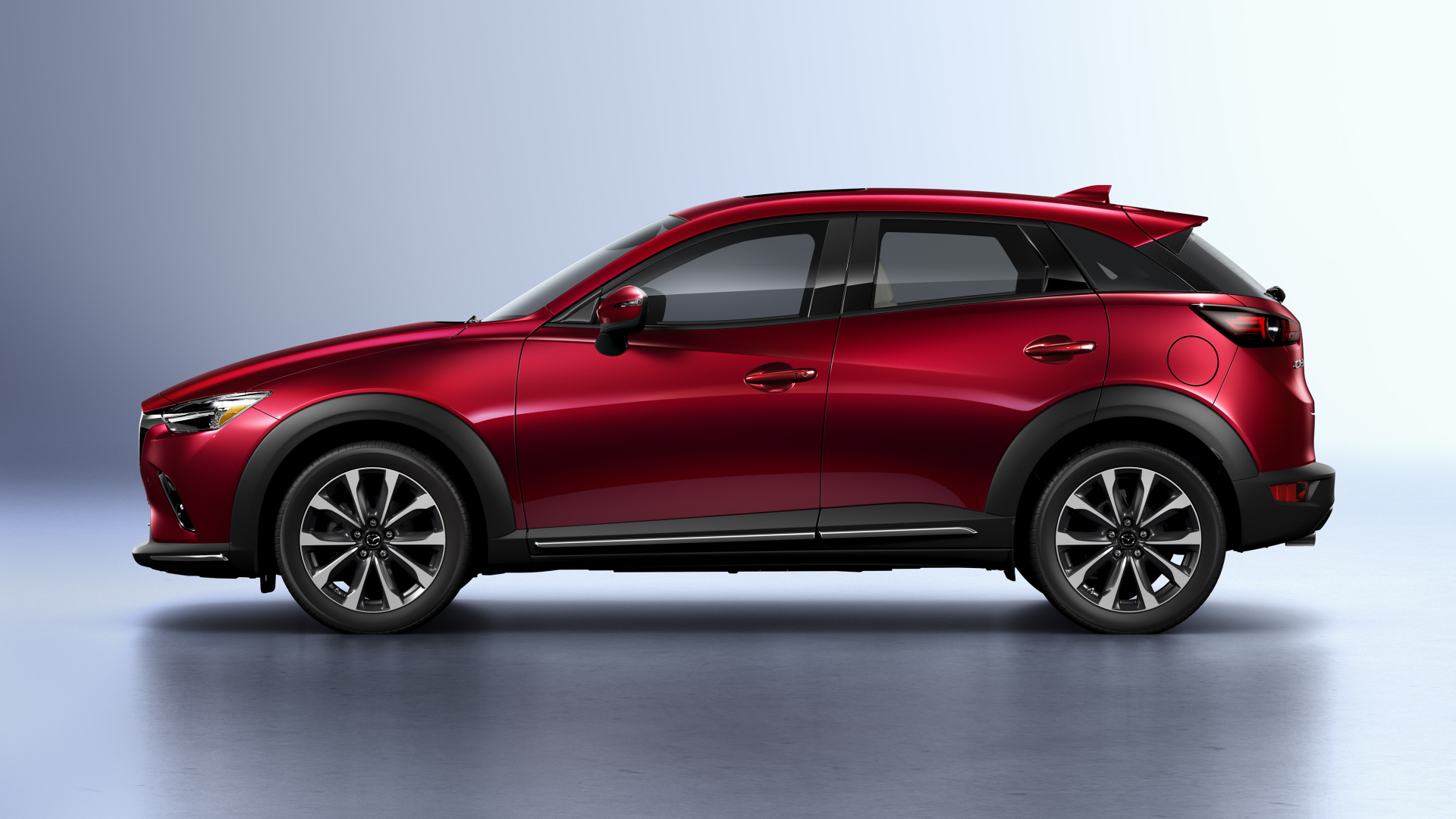 Внедорожник Mazda CX-3, 2019 года вид сбоку