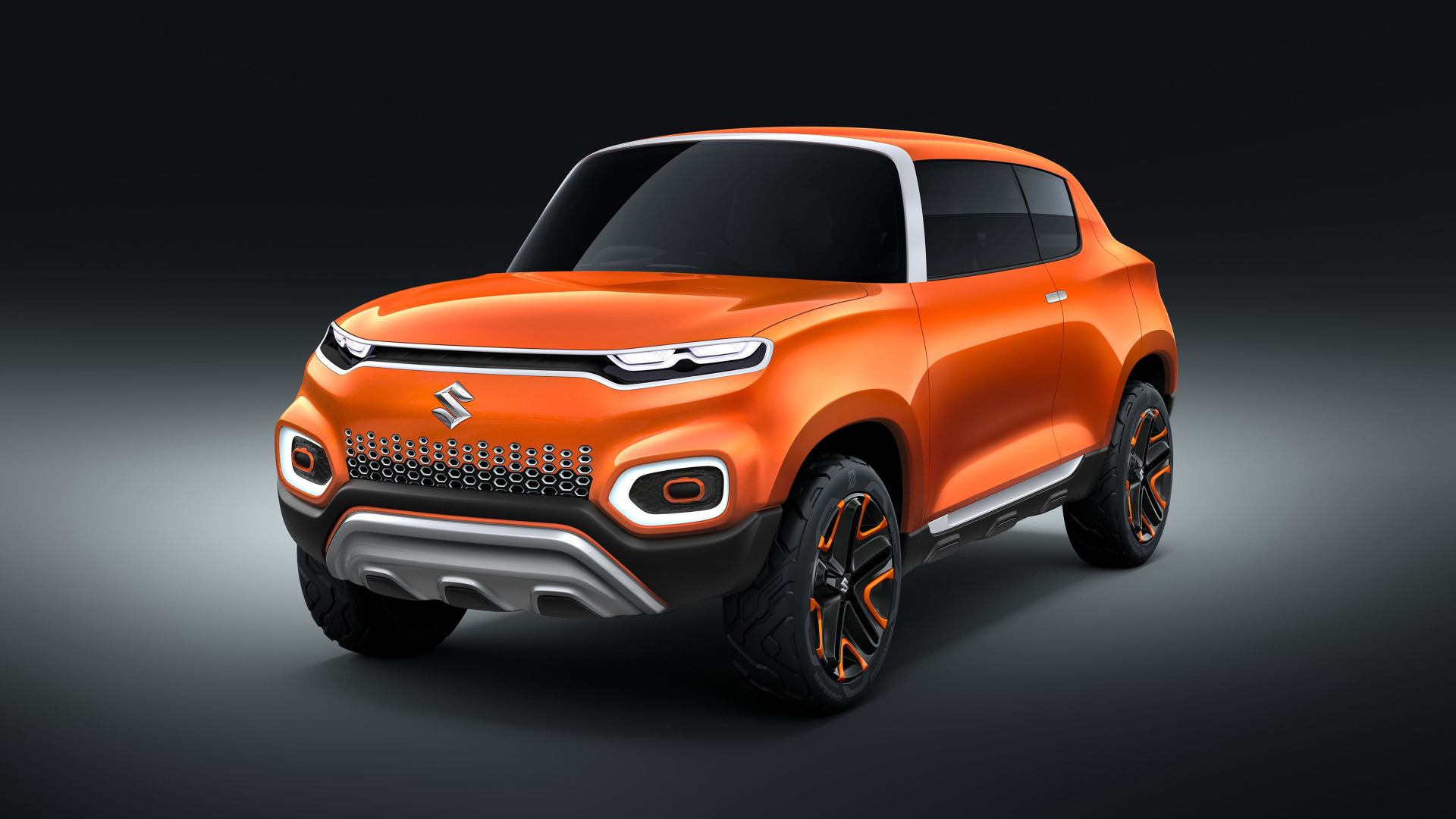 Orange car Suzuki Concept Future S, 2018 on a gray background