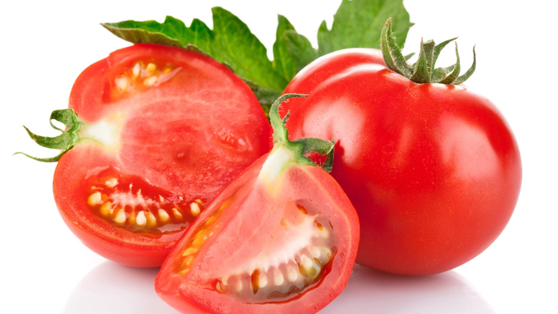 Ripe red tomatoes on white background