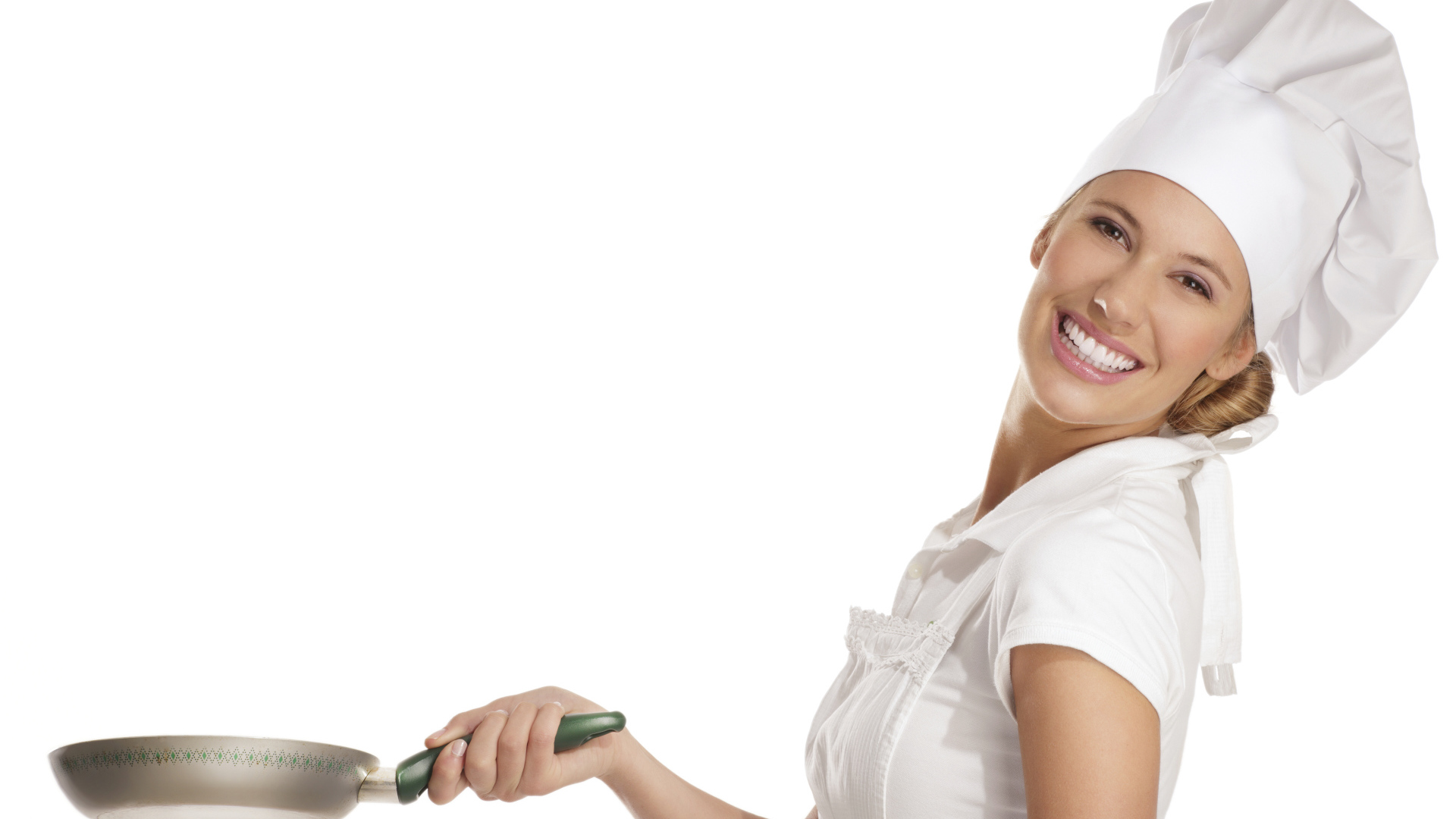 Smiling cook girl with a griddle in hand on white background