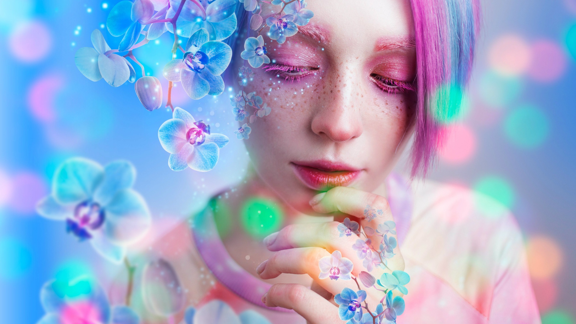 Молодая девушка с розовым макияжем в окружении цветов