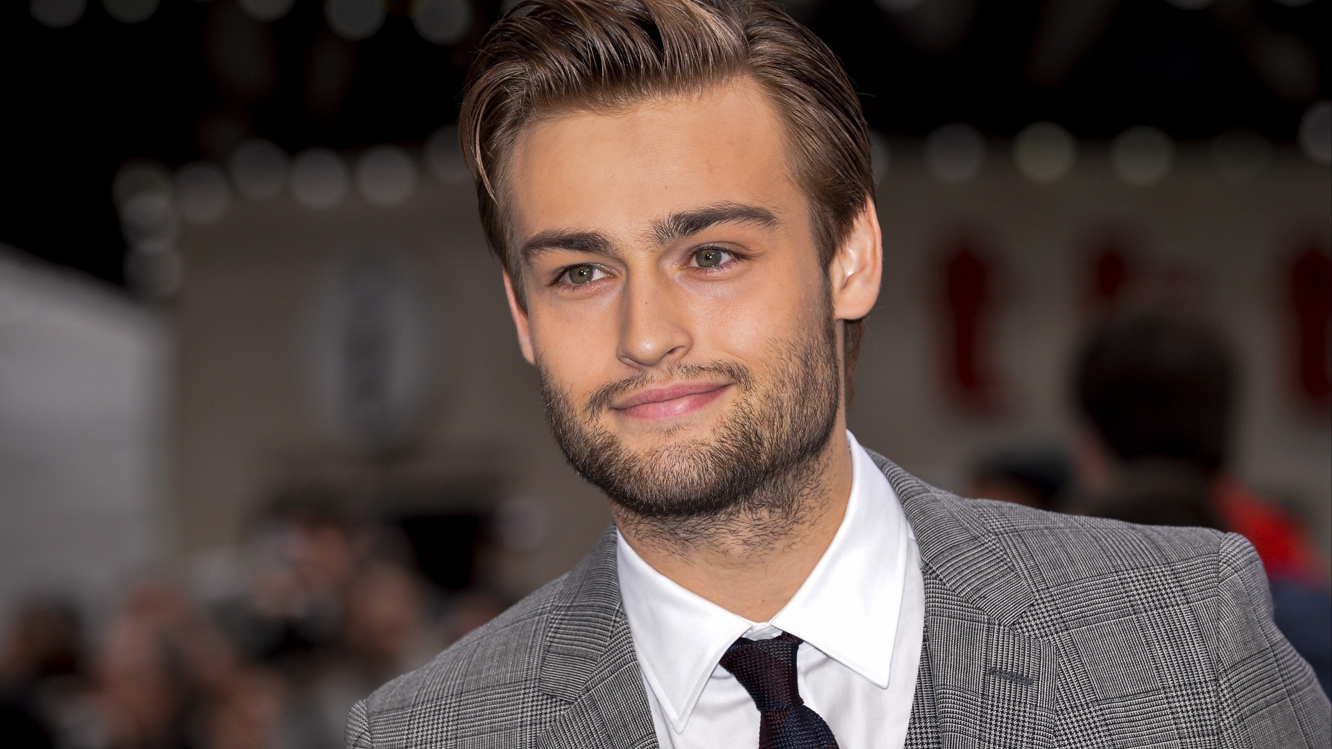 Handsome stylish actor Douglas Booth in costume