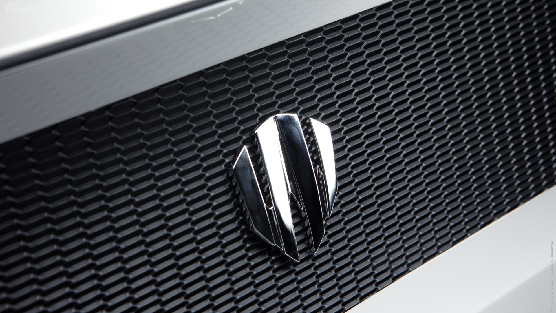 Логотип автомобиля Lykan Hypersport крупным планом