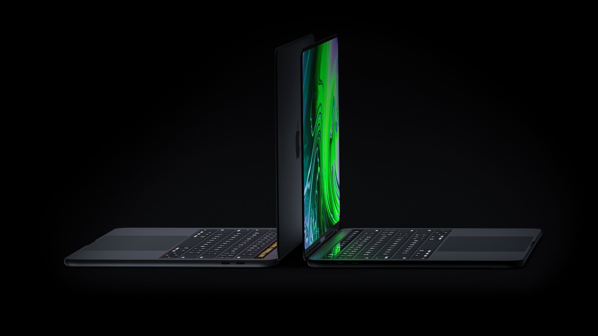Два новых MacBook Pro от Apple, 2019 года на черном фоне