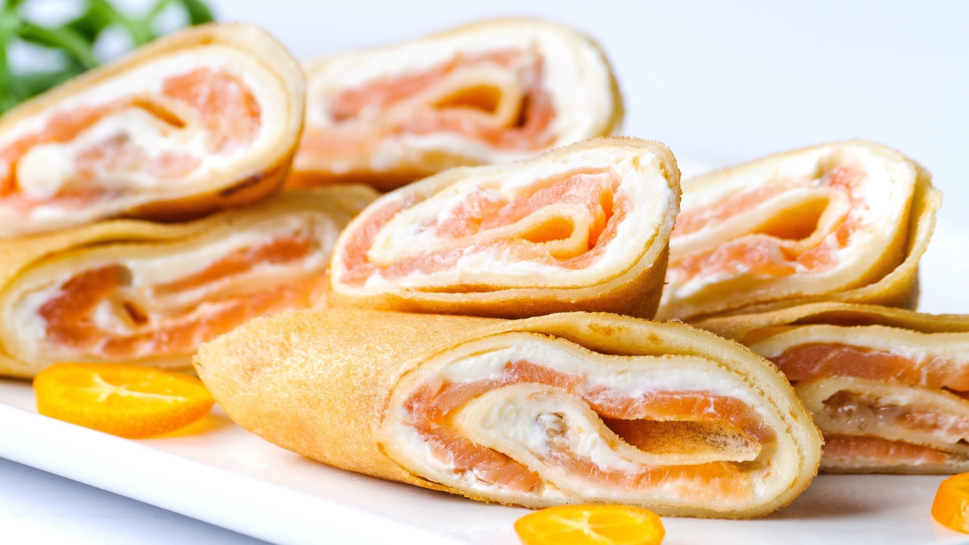 Рулеты из блинов с красной рыбой и сыром