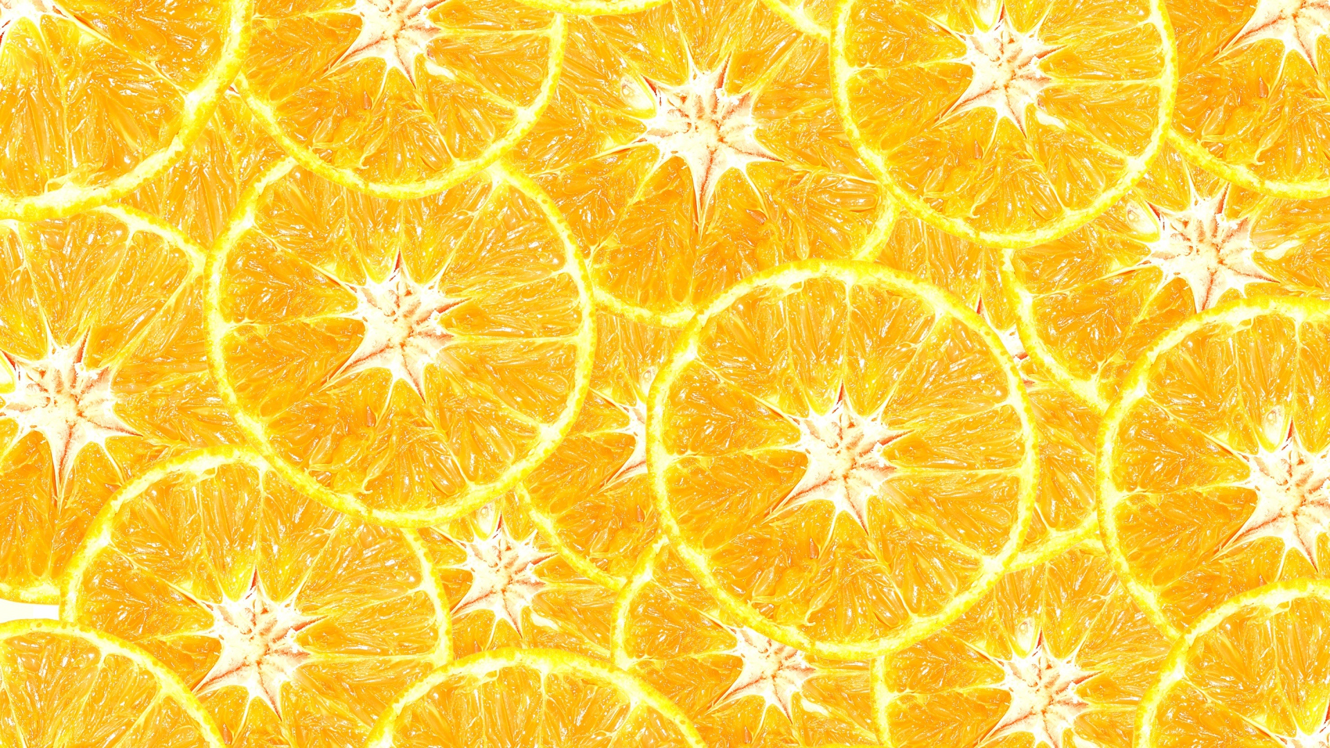 Оранжевый фон из кусочков апельсина крупным планом