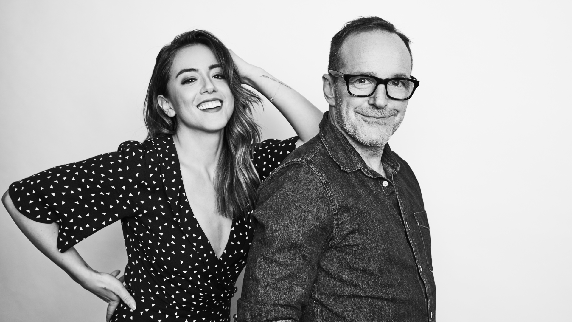 Actress Chloe Bennet and actor Clark Gregg black and white photo