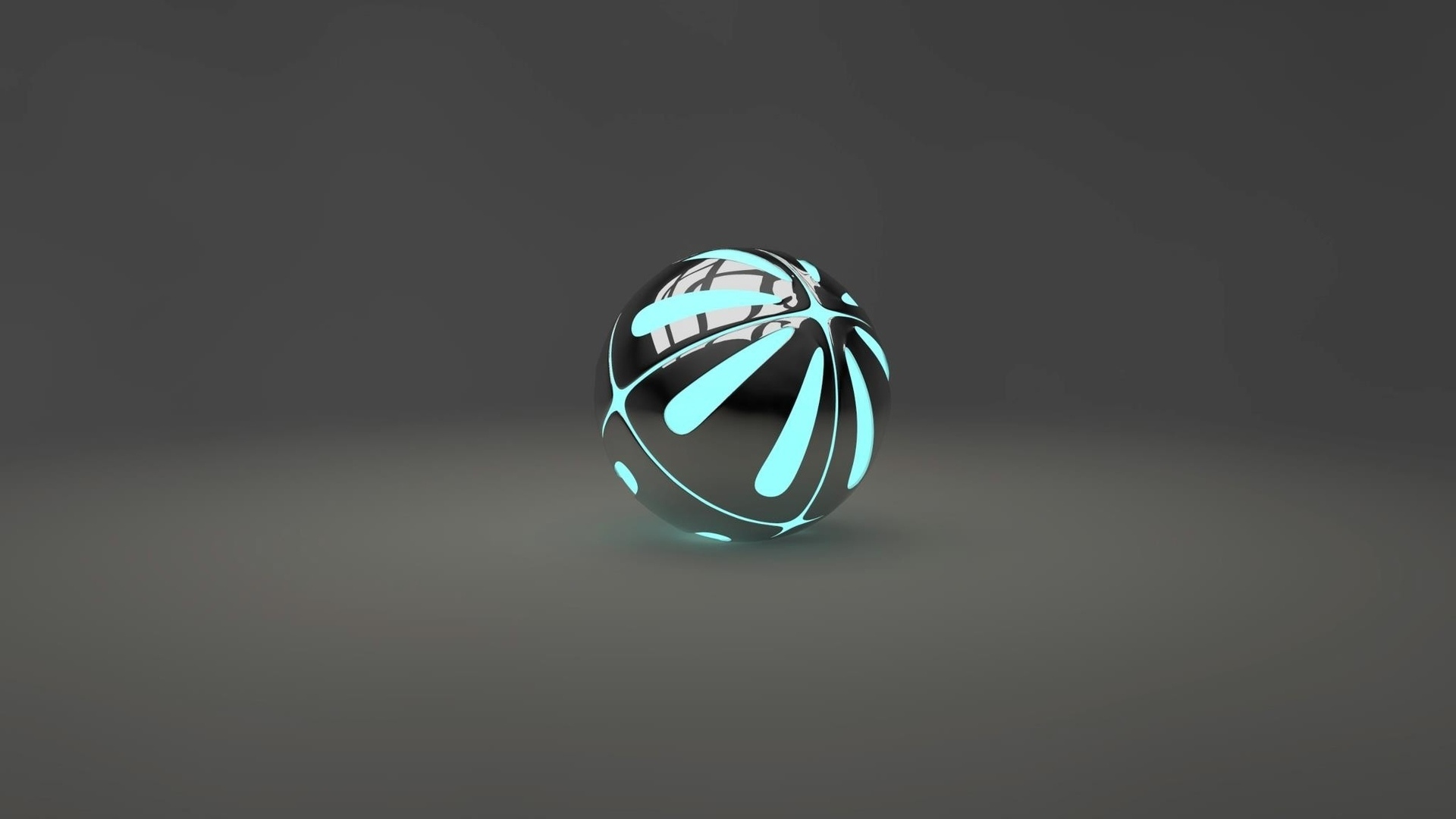 Голубой с черным шарик на сером фоне 