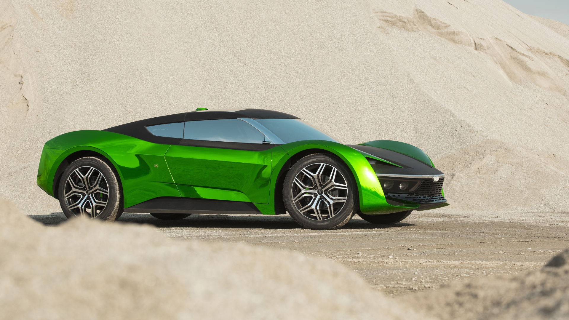 2020 green car GFG Vision stands in the sand