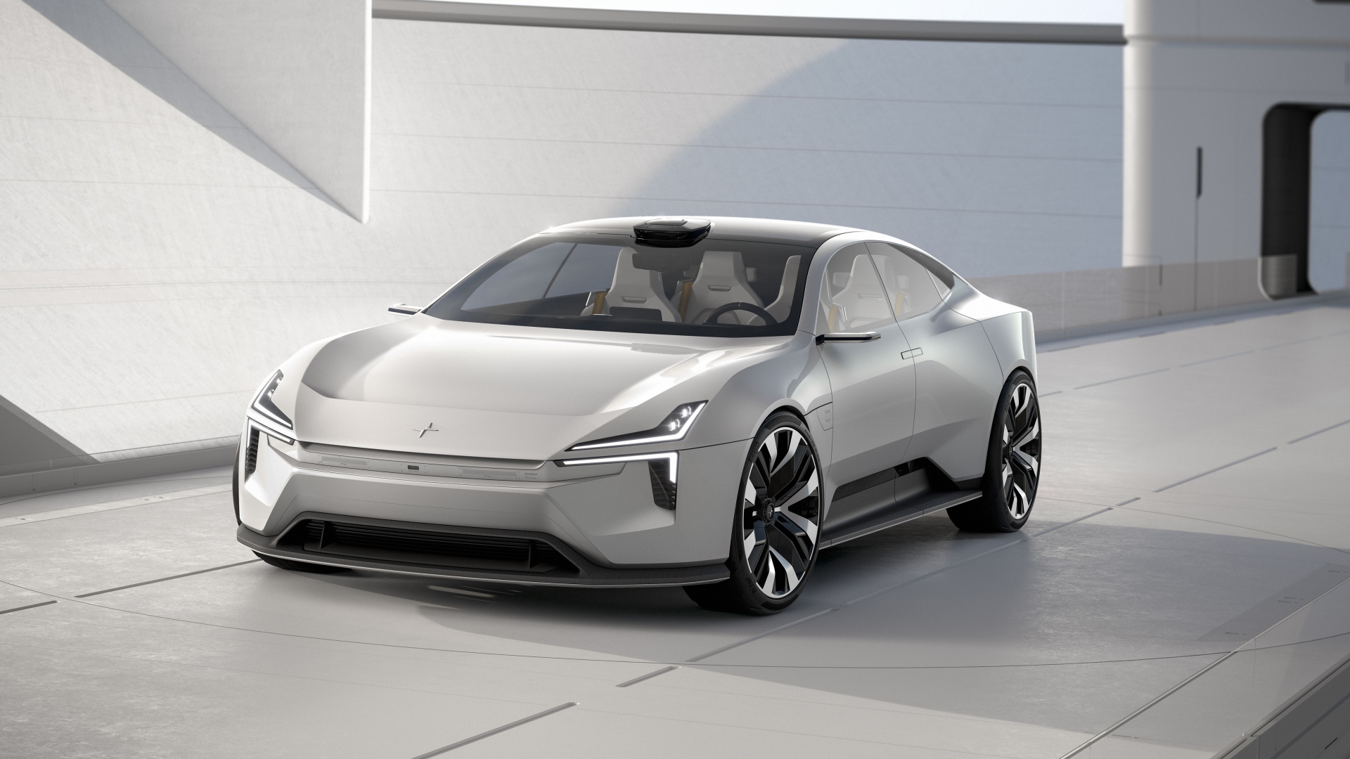 Серебристый автомобиль Polestar Precept 2020 года