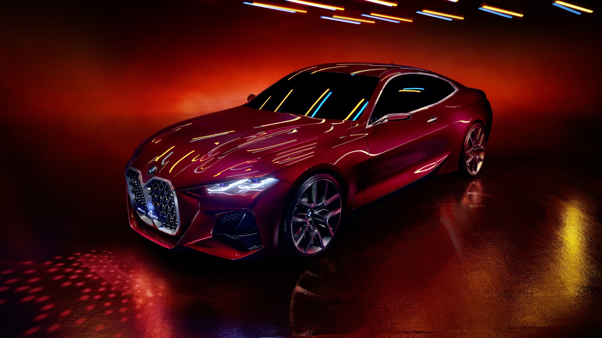 Красный автомобиль BMW Concept 4 2019 года на красном фоне