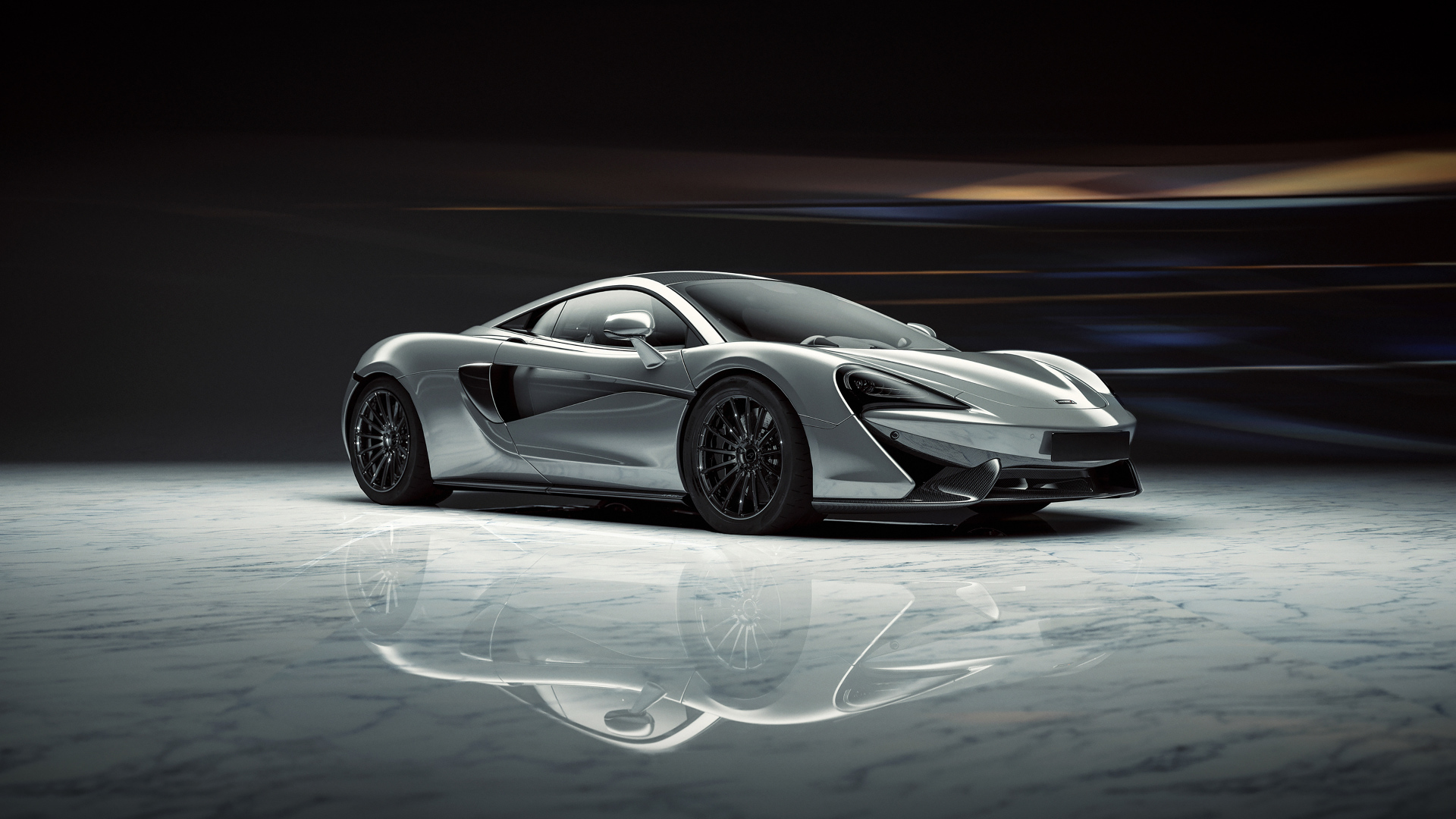 Серый спортивный автомобиль McLaren 520S 