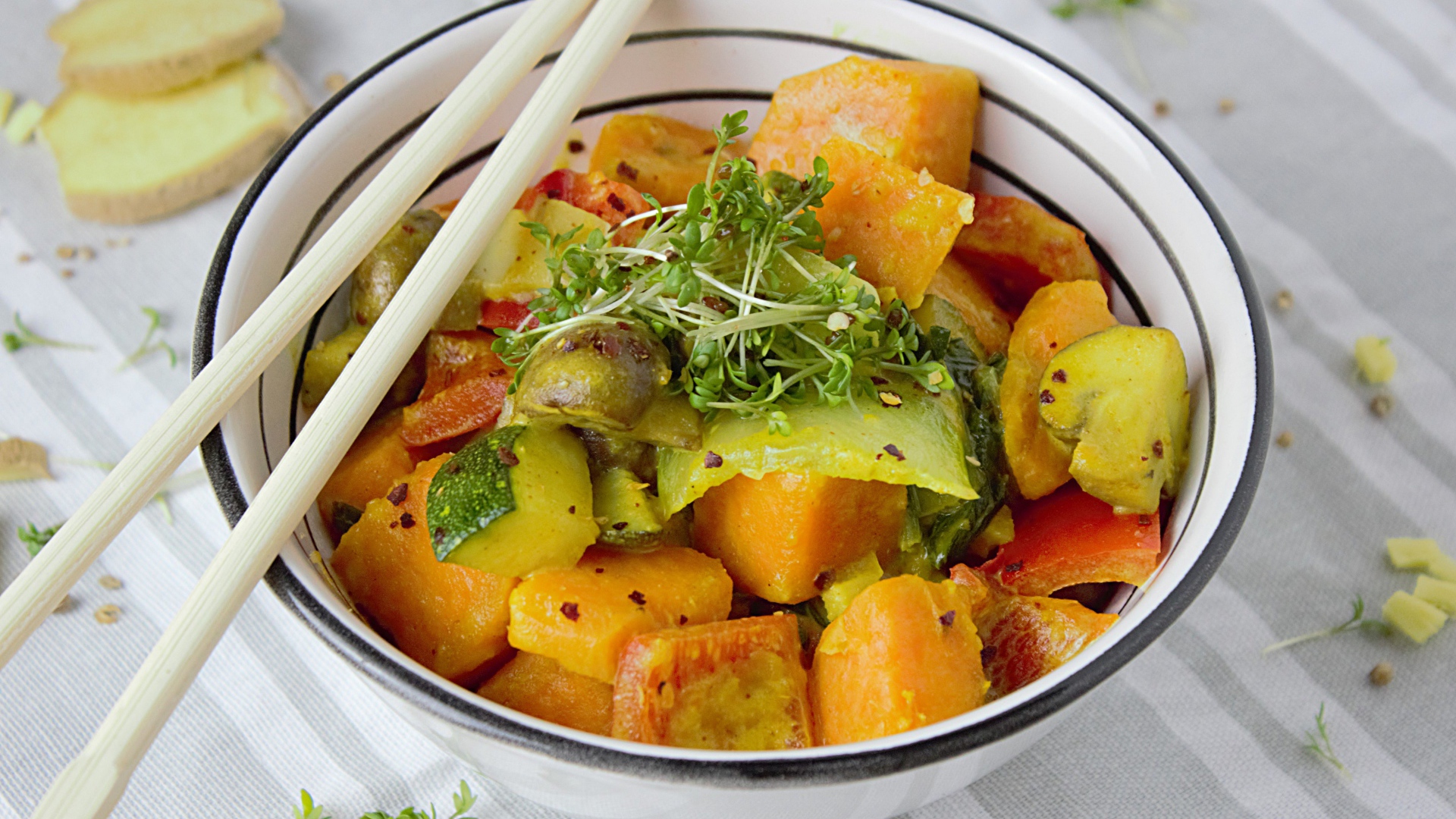 Spicy vegetable dish in a bowl with chopsticks
