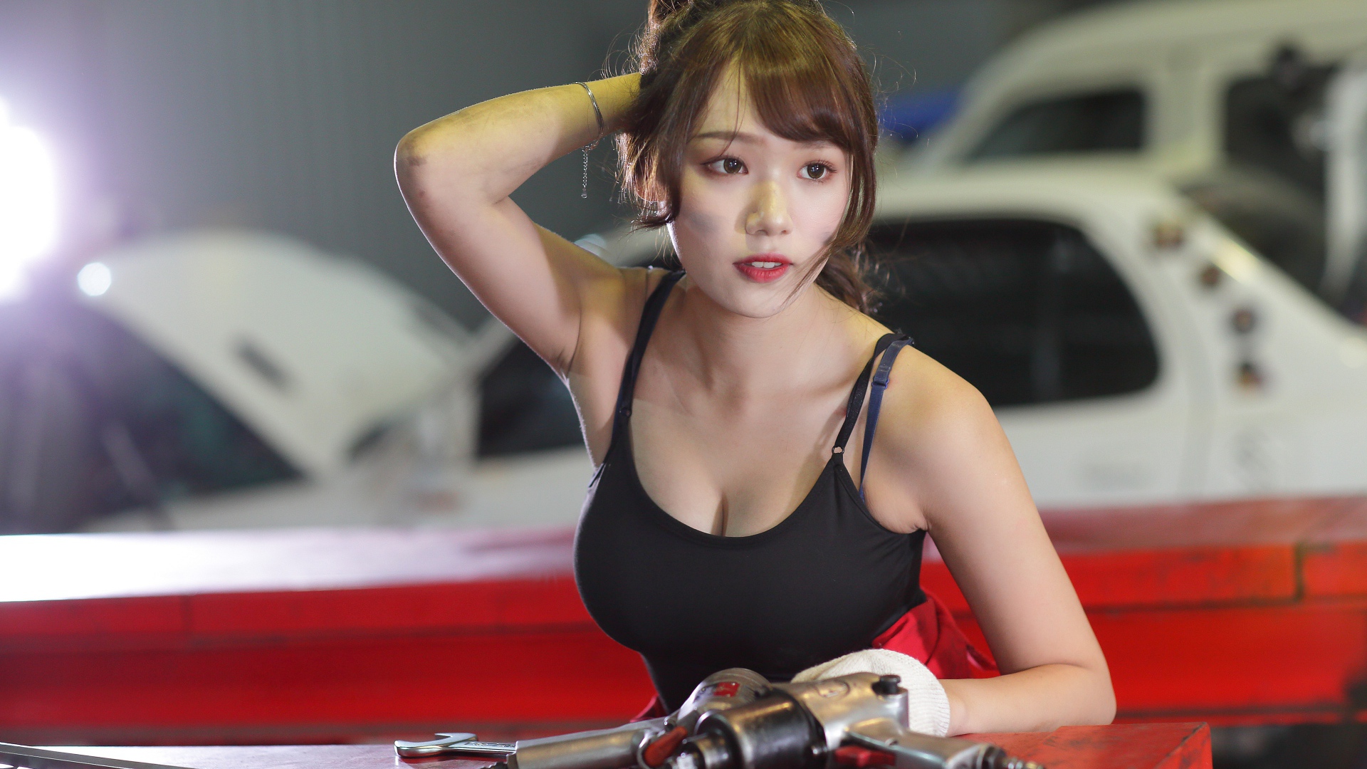 Asian girl car mechanic