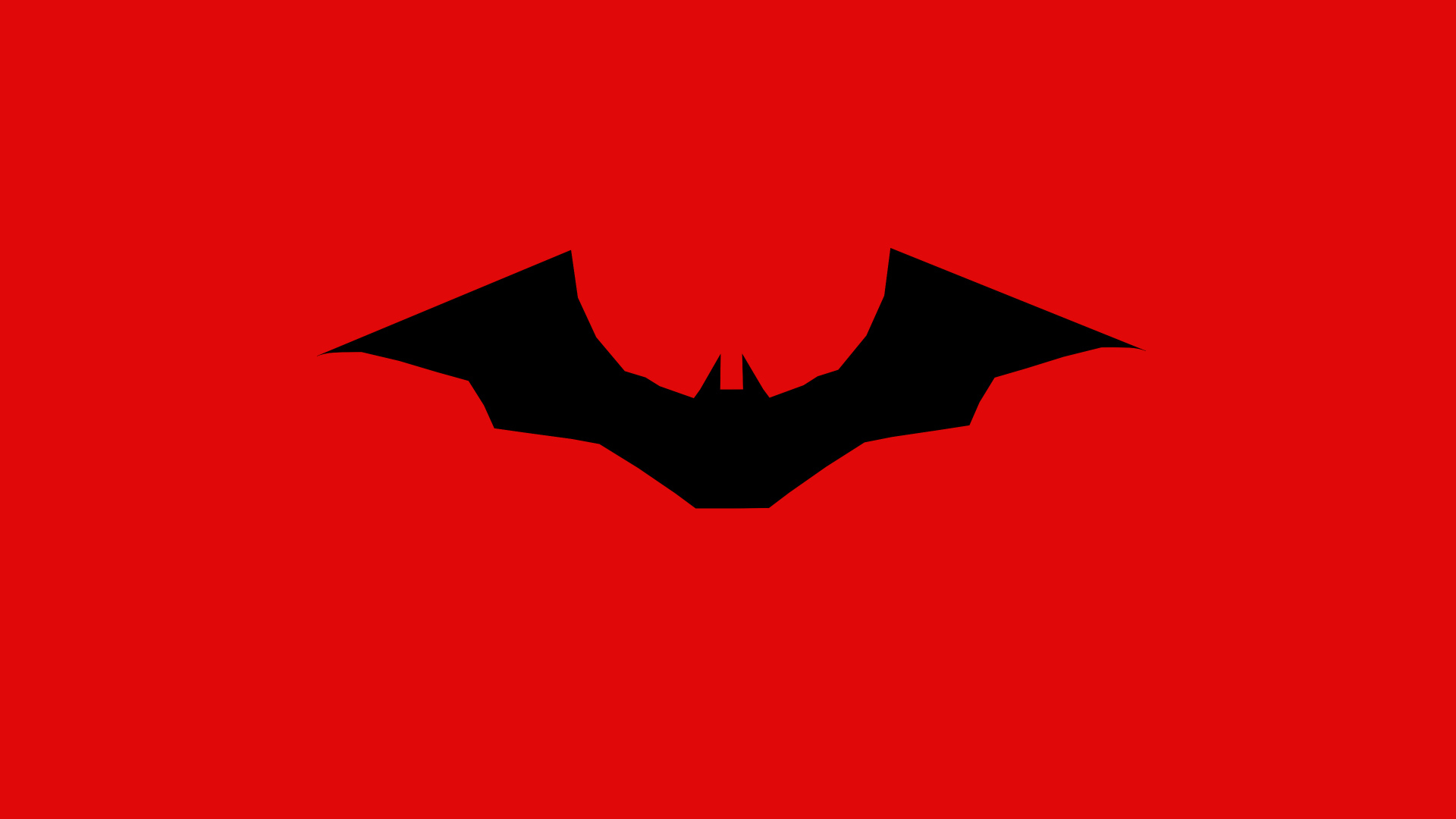 Логотип нового фильма Бэтмен на красном фоне