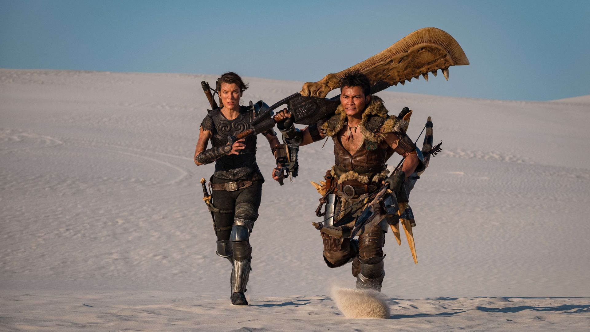 Monster Hunter Movie Characters Run Through the Desert