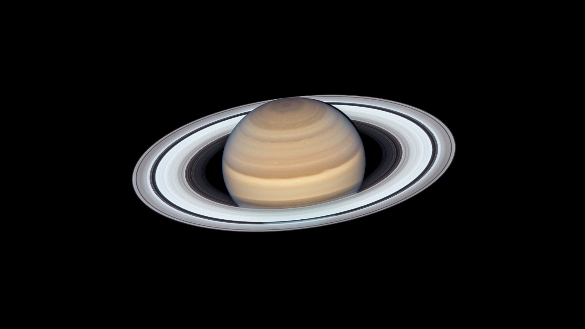 Saturn big planet with rings on a black background